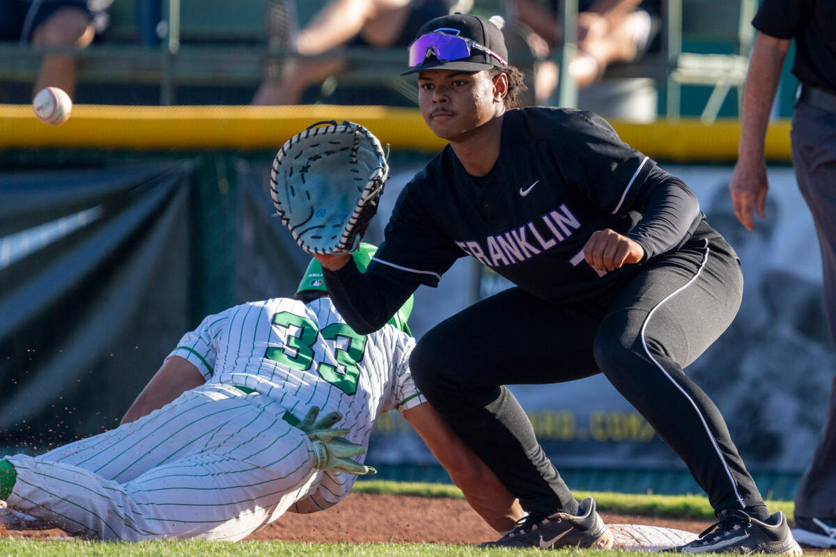 The Franklin High School Wildcats’ Dylan Minnatee catches the ball on a throwback to first during the 2025 CIF Sac-Joaquin Section Division I baseball championship game at Sacramento City College against the St. Mary’s Rams of Stockton. Minnatee is The Bee’s  Large School Player of the Year.